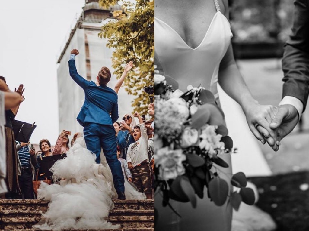 A groom celebrates carrying his bride up the stairs at Lake Bled, Slovenia